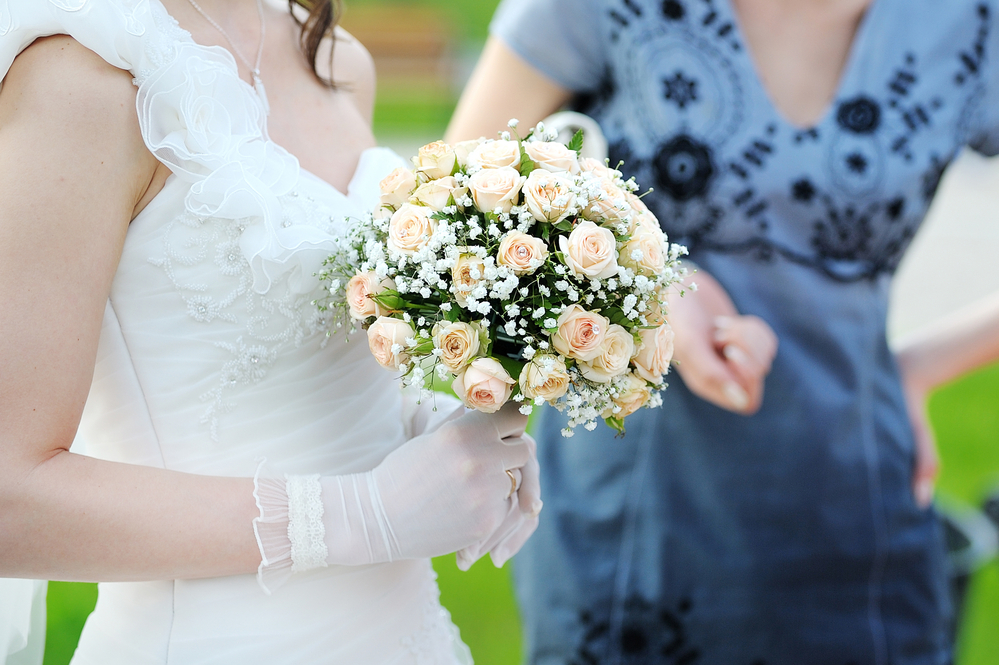 Beautiful wedding bouquet in bride's hand Beautiful wedding bouquet in bride's hand