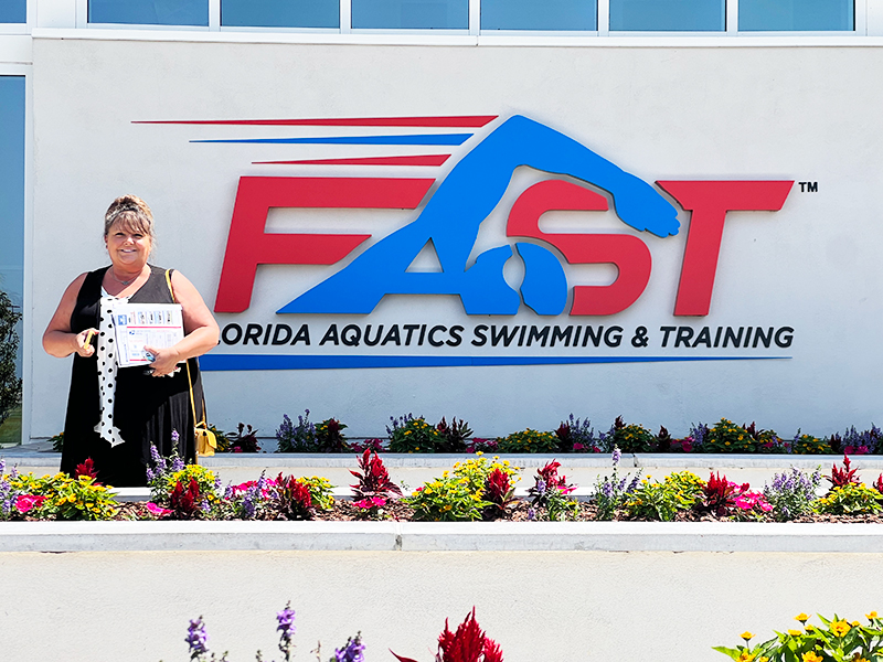 Showcase REALTOR® Dawn Mahler in front of the FAST - Florida Aquatics Swimming & Training in Ocala, FL