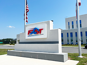 The sign in front of the FAST Facility in Ocala, FL