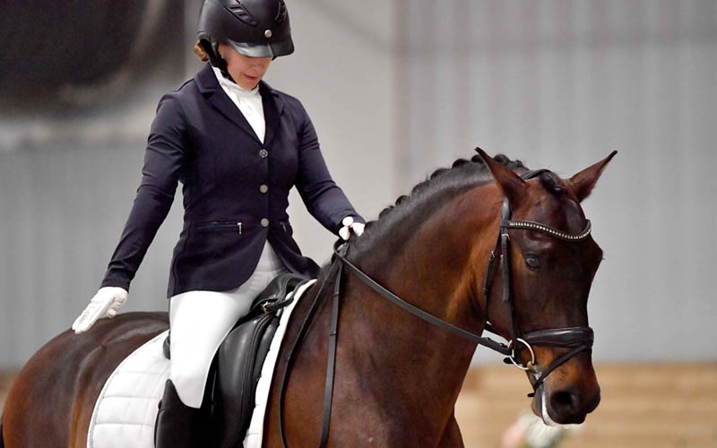 Dana and horse performing a dressage routine